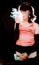 Sissy posing while she Smokes and Strokes pumping her pussy