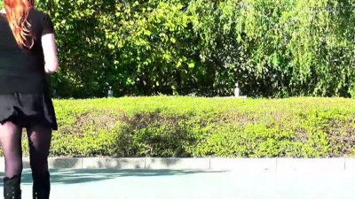 Crossdresser Sissy on windy day outside in short skirt