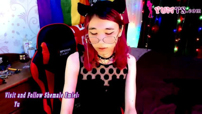skinny redhead teen shemale cutie in glasses strokes her cock on webcam