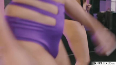 Busty trans fucks female during  workout