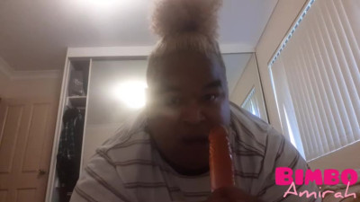Bimbo Ts Amirah sucking and taking a dildo up the ass