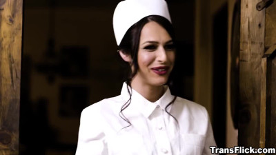 Doctor and nurse both work together to examine Ella Hollywoods body