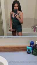 Cute Thai ladyboy plays with her long dick