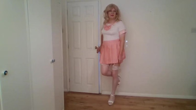 Blonde shemale in pink and white outfit