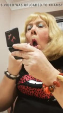 Davina putting on her lipstick
