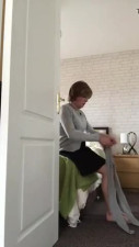 Crossdresser Putting On Shiny Tights Pantyhose and Heel
