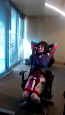 Crossdresser in D Va Bodysuit Tied to a Gaming Chair Pa