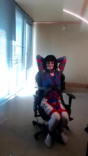 Crossdresser in D Va Bodysuit Tied to a Gaming Chair Pa
