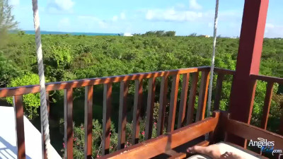 Wanking her massive cock outdoors