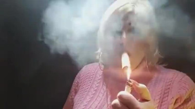 Tgirl Virginia smoking a big cigar