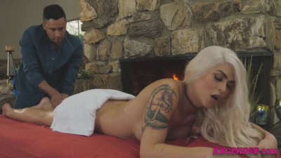 Massaged trans blonde rides masseurs cock