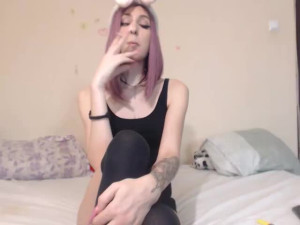 Tattoed teen shemale masturbates