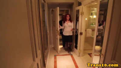 Redhead tgirl in stockings and spex