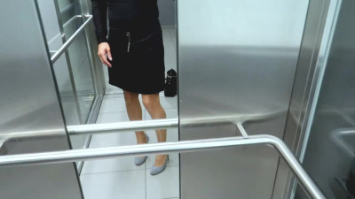 ail show in elevator under women's clothing