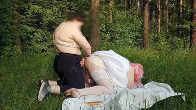 Surrender to the ass in a forest clearing