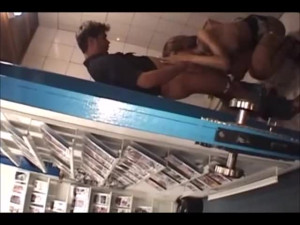 Intriguing She-Male Model Gives Blowjob In The Toilet Of A Porn Shop