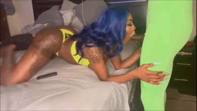Blue haired ebony shemale devouring cock
