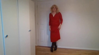 Red dress, black boots, no panties
