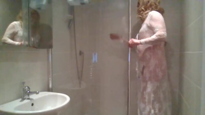 In the shower with soaking white lingerie