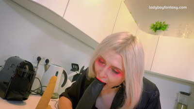 Shemale with small boobs and dick tests sex toys on tight asshole in the kitchen