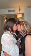 Four crossdressers kissing