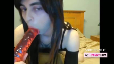 Brunette tranny amateur toys her ass with red dildo