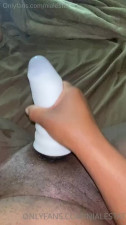Stroking with her toy and busting a big fat nut