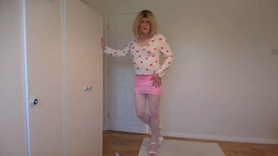 Pink miniskirt and white patterned pantyhose