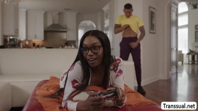 Black TS distracted by strap on and suck it