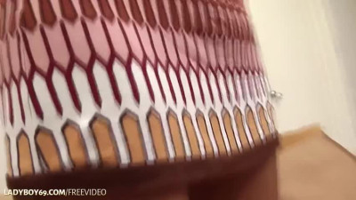 Skinny Asian shemale in tight dress strokes her trimmed dick till cumshot