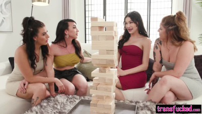 Beautiful big ass babes and two horny big cock shemales enjoys game night