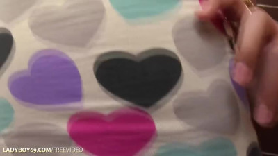 Redhead ladyboy in black pantyhose enjoys solo masturbation in bed