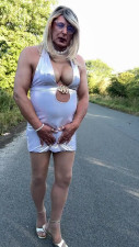Sexy Crossdresser kellycd2022 in shiny gold dress enjoying an afternoon drive