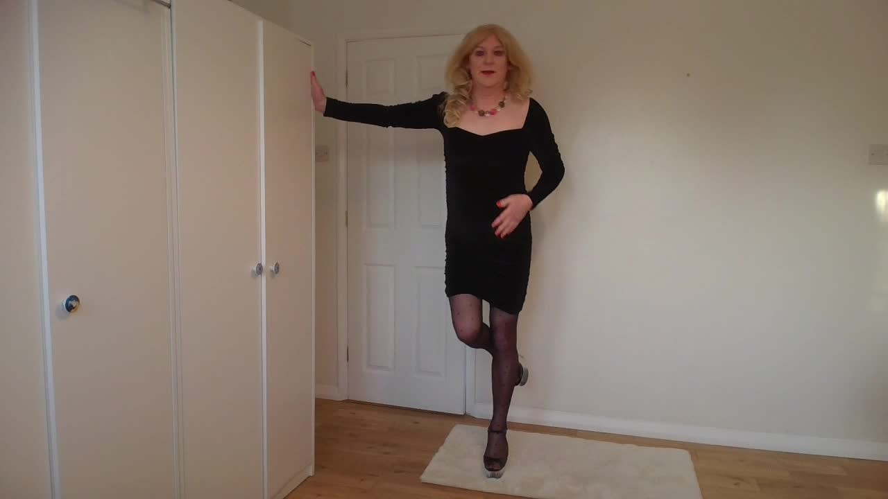 Watch Blonde in a little black dress, stockings and stripper heels Shemale Porn Videos | TranSexBig.