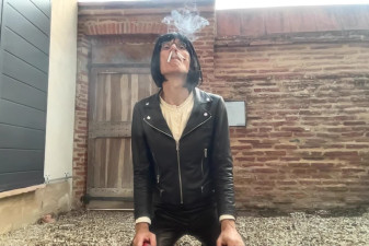 leather crossdresser smoking