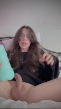 femboy playing with toy