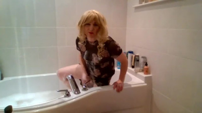 Compilation of black see-through dress, stockings and dildoing in the bath
