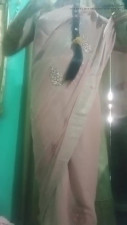 Indian trans woman Gaurisissy pressing and milking her boobs in pink saree