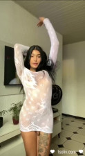 Sexy latina Trans loves stripping away her see through dress for her fans