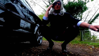 Amateur crossdresser Kellycd2022 in black dress and pantyhose outdoors