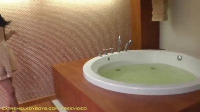 Teen brunette ladyboy in black lingerie gets fucked in the bathtub