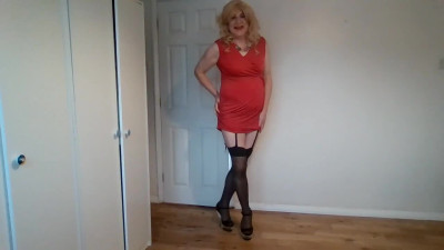 Blonde in red dress and black stockings with no panties on