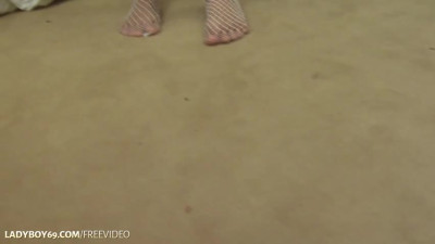 Petite ladyboy with sunglasses jerks off her big dick until cumshot