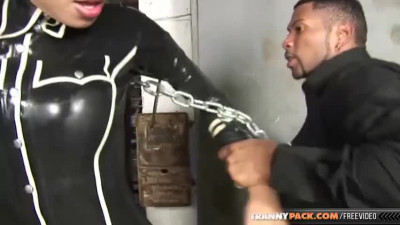 Stunning shemale in black leather boots gets dominated by two dudes